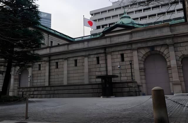 Japan self-trades government bonds to stabilize rates as fiscal cliff nears.