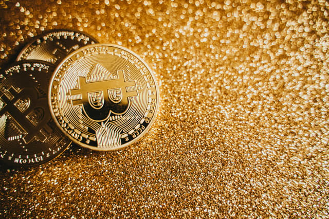 Bitcoin experiences a dip after nearing its historical peak.